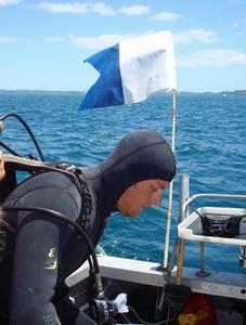 Doing it right - a diver correctly flying a dive flag.